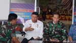 Foto: Jokowi Berjaket Loreng Saat Tiba di Palu