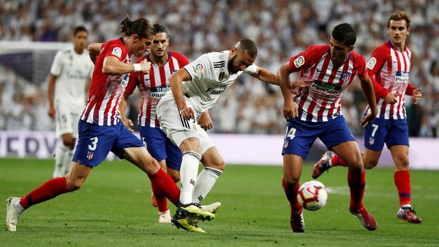 Real Madrid ditahan imbang Atletico Madrid.