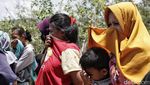 Potret Pemakaman Massal Korban Gempa-Tsunami Palu
