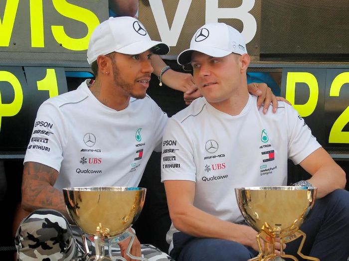 Lewis Hamilton menangi GP Rusia karena team order. (Foto: Maxim Shemetov/Reuters) Lewis Hamilton menangi GP Rusia karena team order. (Foto: Maxim Shemetov/Reuters)