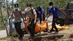 Potret Pemakaman Massal Korban Gempa-Tsunami Palu