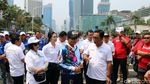 Kemeriahan Pawai Obor Asian Para Games 2018 di CFD