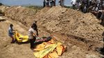 Potret Pemakaman Massal Korban Gempa-Tsunami Palu