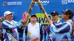 Kemeriahan Pawai Obor Asian Para Games 2018 di CFD