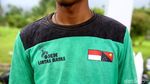 Jalan-jalan Naik Ojek Lintas Batas di PLBN Skouw