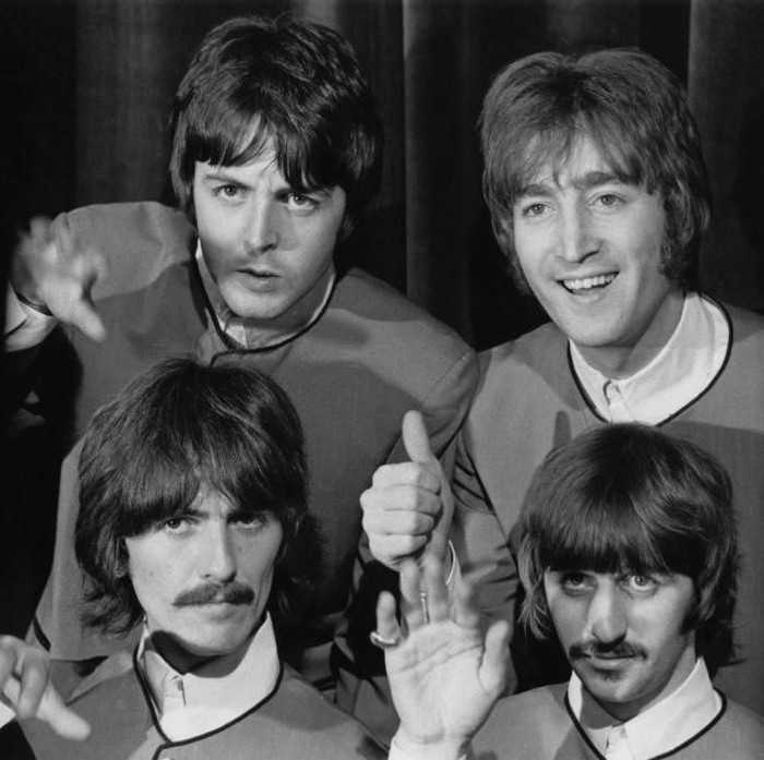 English rock band the Beatles prepare to perform their new single Hello, Goodbye on stage at the Saville Theatre, London, 1967. Clockwise from top left, they are Paul McCartney, John Lennon, Ringo Starr and George Harrison. (Photo by Keystone Features/Hulton Archive/Getty Images)