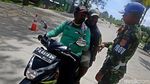 Jalan-jalan Naik Ojek Lintas Batas di PLBN Skouw