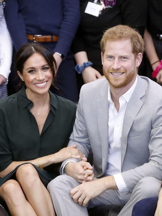 Love is in the air! Pangeran Harry dan Meghan Markle seperti pasangan yang sedang berbulan madu. (Foto: Getty Images)
