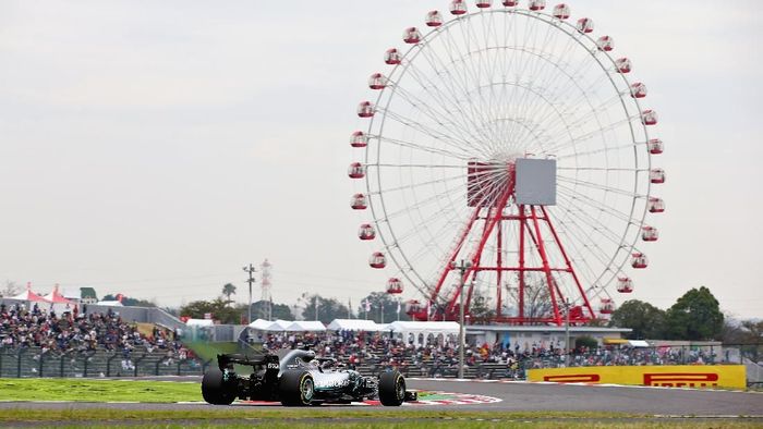 Sesi kualifikasi GP Jepang diundur sehari karena ada badai di Hari Sabtu (Charles Coates/Getty Images) Sesi kualifikasi GP Jepang diundur sehari karena ada badai di Hari Sabtu (Charles Coates/Getty Images)