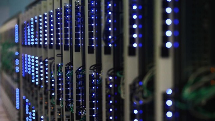 MEYRIN, SWITZERLAND - APRIL 19:  A detailed view in the CERN Computer / Data Centre and server farm of the 1450 m2 main room during a behind the scenes tour at CERN, the Worlds Largest Particle Physics Laboratory on April 19, 2017 in Meyrin, Switzerland.  Experiments at CERN generate colossal amounts of data (the LHC experiments produce over 30 petabytes of data per year). The Data Centre stores it, and sends it around the world for analysis. Archiving the vast quantities of data is an essential function at CERN. CERN has more than 130 Petabytes of stored data (the equivalent of 700 years of full HD-quality movies). CERN does not have the computing or financial resources to crunch all of the data on site, so in 2002 it turned to grid computing to share the burden with computer centres around the world.  The centre maintains disk and tape servers, which need to be upgraded regularly.  (Photo by Dean Mouhtaropoulos/Getty Images)