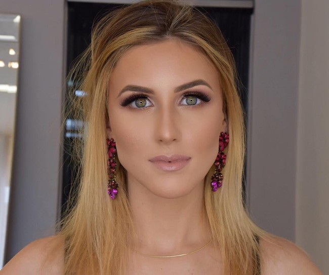 Ia mengklaim jika Eric menjadi marah setelah melihat postingan foto dirinya yang mengenakan tanktop hitam dengan rambut diikat diunggah di akun Instagramnya. Foto: Instagram @melissalgentz