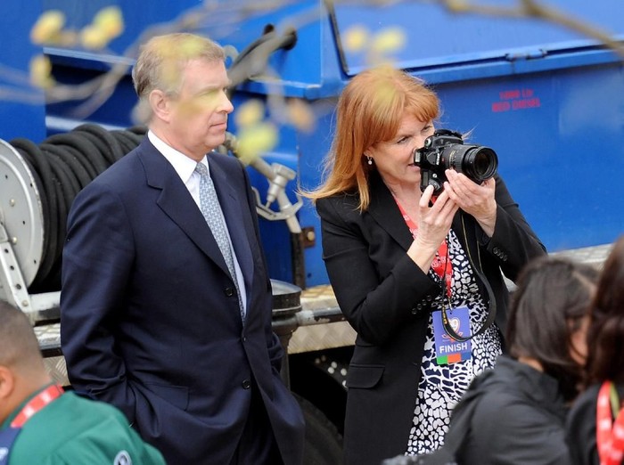ODIHAM, ENGLAND - MARCH 24: The Duchess Of York speaks to her Ex-Husband Prince Andrew as they arrive at All Saints Church, Odiham, Hampshire, England for a Thanksgiving Service for Major Ronald Ferguson March 24, 2003. The Major, who died last week, was the ex-Father in Law of H.R.H. Prince Andrew and had been polo manager to H.R.H. Prince Charles. (Photo by Julian Herbert/Getty Images)