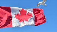 Kanada, Swiss, Irlandia dan Belgia berbagi tempat keenam dalam laporan Henley Passport Index. Warga dari negara ini diberi akses bebas visa atau VoA ke 185 negara (Nicholas Kamm/AFP/Getty Images/CNN Travel)