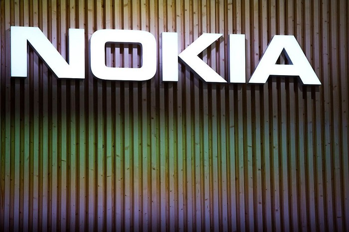 BARCELONA, SPAIN - MARCH 03:  A logo sits illuminated outside the Nokia pavilion during the second day of the Mobile World Congress 2015 at the Fira Gran Via complex on March 3, 2015 in Barcelona, Spain. The annual Mobile World Congress hosts some of the wolds largest communication companies, with many unveiling their latest phones and wearables gadgets.  (Photo by David Ramos/Getty Images)