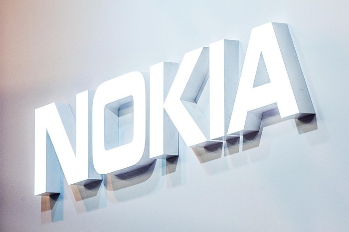 BARCELONA, SPAIN - FEBRUARY 22:  A logo sits illuminated outside the Nokia pavilion on the opening day of the World Mobile Congress at the Fira Gran Via Complex on February 22, 2016 in Barcelona, Spain. The annual Mobile World Congress hosts some of the worlds largest communications companies, with many unveiling their latest phones and wearables gadgets.  (Photo by David Ramos/Getty Images)
