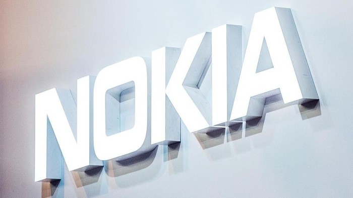 BARCELONA, SPAIN - FEBRUARY 22:  A logo sits illuminated outside the Nokia pavilion on the opening day of the World Mobile Congress at the Fira Gran Via Complex on February 22, 2016 in Barcelona, Spain. The annual Mobile World Congress hosts some of the worlds largest communications companies, with many unveiling their latest phones and wearables gadgets.  (Photo by David Ramos/Getty Images)