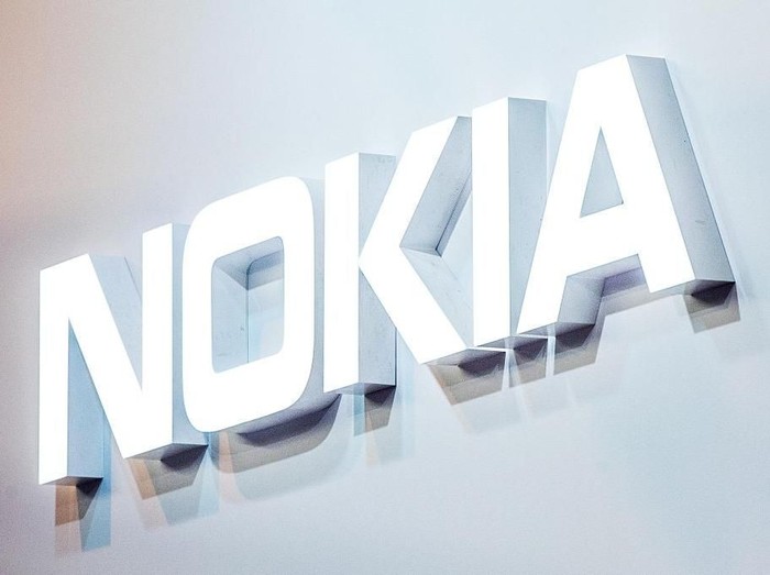 BARCELONA, SPAIN - FEBRUARY 22:  A logo sits illuminated outside the Nokia pavilion on the opening day of the World Mobile Congress at the Fira Gran Via Complex on February 22, 2016 in Barcelona, Spain. The annual Mobile World Congress hosts some of the worlds largest communications companies, with many unveiling their latest phones and wearables gadgets.  (Photo by David Ramos/Getty Images)