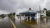 Banjir menggenangi sejumlah daerah akibat Topan Michael di kawasan Florida, Amerika Serikat. Mark Wallheiser/Getty Images.