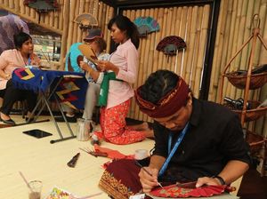 Mengenalkan Budaya Bali Lewat Kipas Lukis di Pertemuan IMF-WB 2018