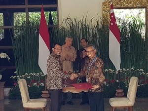 Kembangkan Fintech, OJK dan Singapura Jalin Kerja Sama