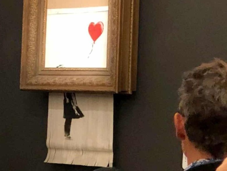 Lukisan Banksy Rp 20 M Kini Punya Nama Baru Love is in the Bin Lukisan Banksy Rp 20 M Kini Punya Nama Baru Love is in the Bin