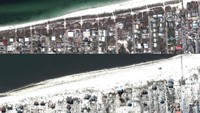 Pantai dan dermaga di Floria juga mengalami kerusakan parah. Satellite image ©2018 DigitialGlobe, a Maxar company/Handout via REUTERS.