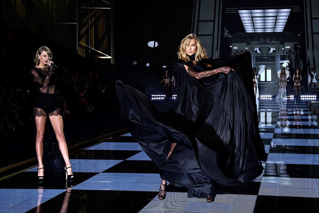 NEW YORK, NY - NOVEMBER 13:  Singer Taylor Swift performs and model Karlie Kloss walks the runway at the 2013 Victoria's Secret Fashion Show at Lexington Avenue Armory on November 13, 2013 in New York City.  (Photo by Bryan Bedder/Getty Images for Swarovski)