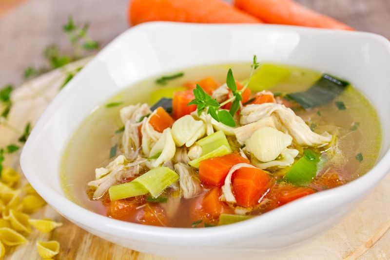 Carrot soup on wooden background