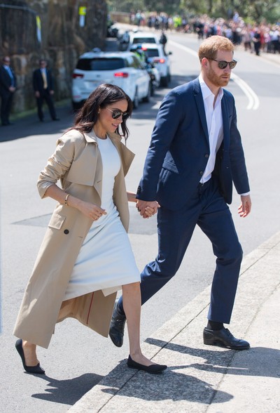 Gaya Meghan Markle dengan sepatu flats. Foto: Dok. Getty Images Gaya Meghan Markle dengan sepatu flats. Foto: Dok. Getty Images