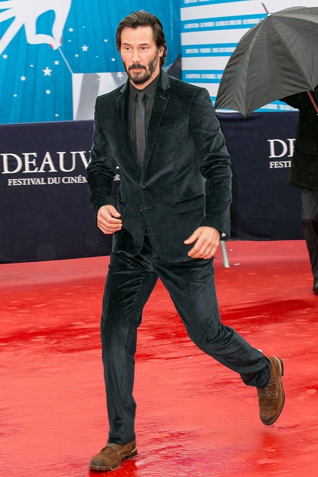 Keanu Reeves yang masih tampak gagah di usia 55 tahun masuk di urutan keenam. (Foto: Getty Images)