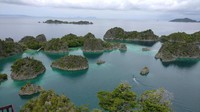 Jawabannya ini adalah foto pemandangan di salah satu kawasan wisata Raja Ampat. (Foto: detikHealth) 