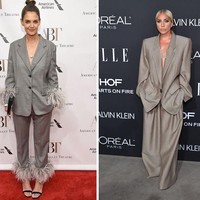 Lady Gaga dan Katie Holmes sedang sehati untuk urusan berbusana pekan ini. Keduanya kompak bergaya maskulin dalam balutan setelan abu-abu tanpa dalaman saat menghadiri acara yang berbeda. (Foto: Getty Images)