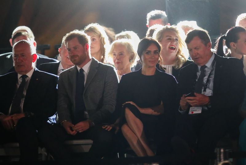 SYDNEY, AUSTRALIA - OCTOBER 20: Peter Crosgrove, Prince Harry, Duke of SussexÃŠandÃŠMeghan, Duchess of Sussex seated watching during the Invictus Games Sydney 2018 Opening Ceremony at Sydney Opera House on October 20, 2018 in Sydney, Australia.  (Photo by Chris Jackson/Getty Images for the Invictus Games Foundation)
