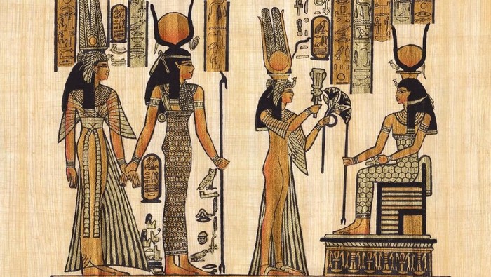 Cleopatra type woman with eyes closed.