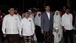Gaya Menggemaskan Jan Ethes Saat Diajak Jokowi ke Apel Akbar Santri