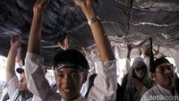 Aksi itu merupakan respon atas pembakaran bendera tauhid oleh anggota banser di dalam acara Hari Santri Nasional di Garut. Massa aksi itu pun menuntut pembubaran Banser sebagai imbas kejadian tersebut.