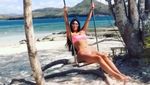 Beda Gaya Liburan Kim dan Kourtney Kardashian di Bali