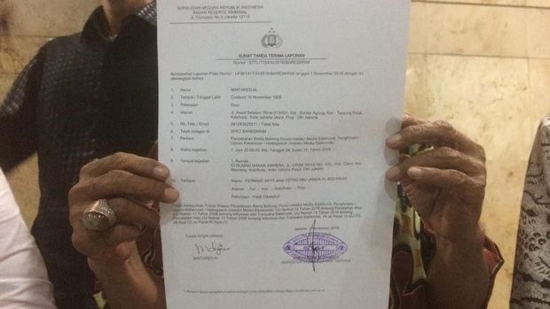 Surat tanda terima laporan Abu Janda. (Foto: Rolando Fransiscus/detikcom)