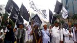 Bendera Tauhid Berkibar dan Dibentangkan di Aksi 211