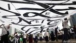 Bendera Tauhid Berkibar dan Dibentangkan di Aksi 211