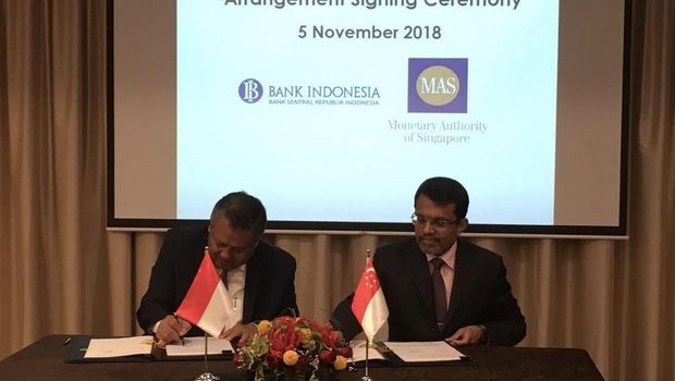 BI dan Bank Sentral Singapura Resmi Teken Swap Rp 100 T