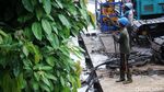 Pembangunan Turap Sungai Ciliwung Dikebut Siang Malam
