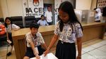 Antusiasme Siswa SD Saat Simulasi Mencoblos