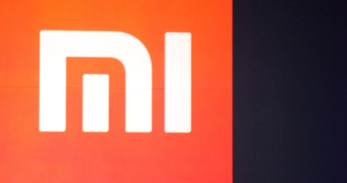 BEIJING, CHINA - MAY 15:  (CHINA OUT) Xiaomi CEO Lei Jun speaks during a product launch on May 15, 2014 in Beijing, China. Privately owned Chinese electronics company Xiaomi has lauched its first tablet and low-price 4K TV on Thursday. The newly launched 