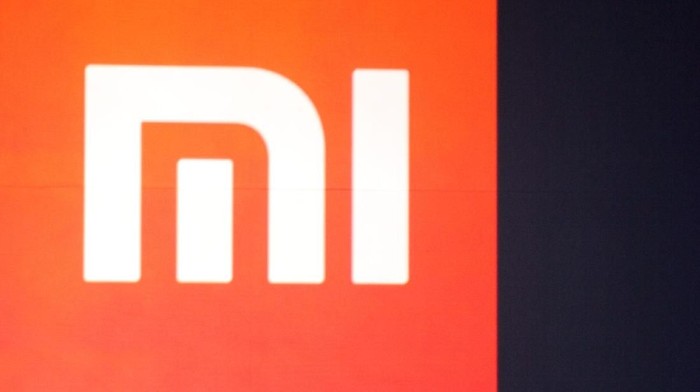 BEIJING, CHINA - MAY 15:  (CHINA OUT) Xiaomi CEO Lei Jun speaks during a product launch on May 15, 2014 in Beijing, China. Privately owned Chinese electronics company Xiaomi has lauched its first tablet and low-price 4K TV on Thursday. The newly launched 