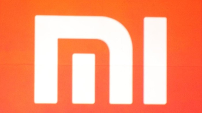 BEIJING, CHINA - MAY 15:  (CHINA OUT) Xiaomi CEO Lei Jun speaks during a product launch on May 15, 2014 in Beijing, China. Privately owned Chinese electronics company Xiaomi has lauched its first tablet and low-price 4K TV on Thursday. The newly launched 