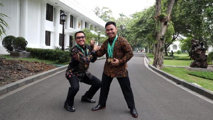 Eko Yuli Irawan (kanan) bersama Menpora Imam Nahrawi (Dok. Humas Kemenpora) Eko Yuli Irawan (kanan) bersama Menpora Imam Nahrawi (Dok. Humas Kemenpora)