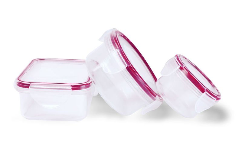 Row of Plastic Storage Containers on White Background