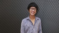 Aming terlihat tampil dengan gaya yang berbeda. Pool/Ismail/detikFoto.