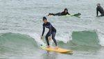 Foto: Gaya Liburan Miss Korea 2017 yang Hobi Surfing